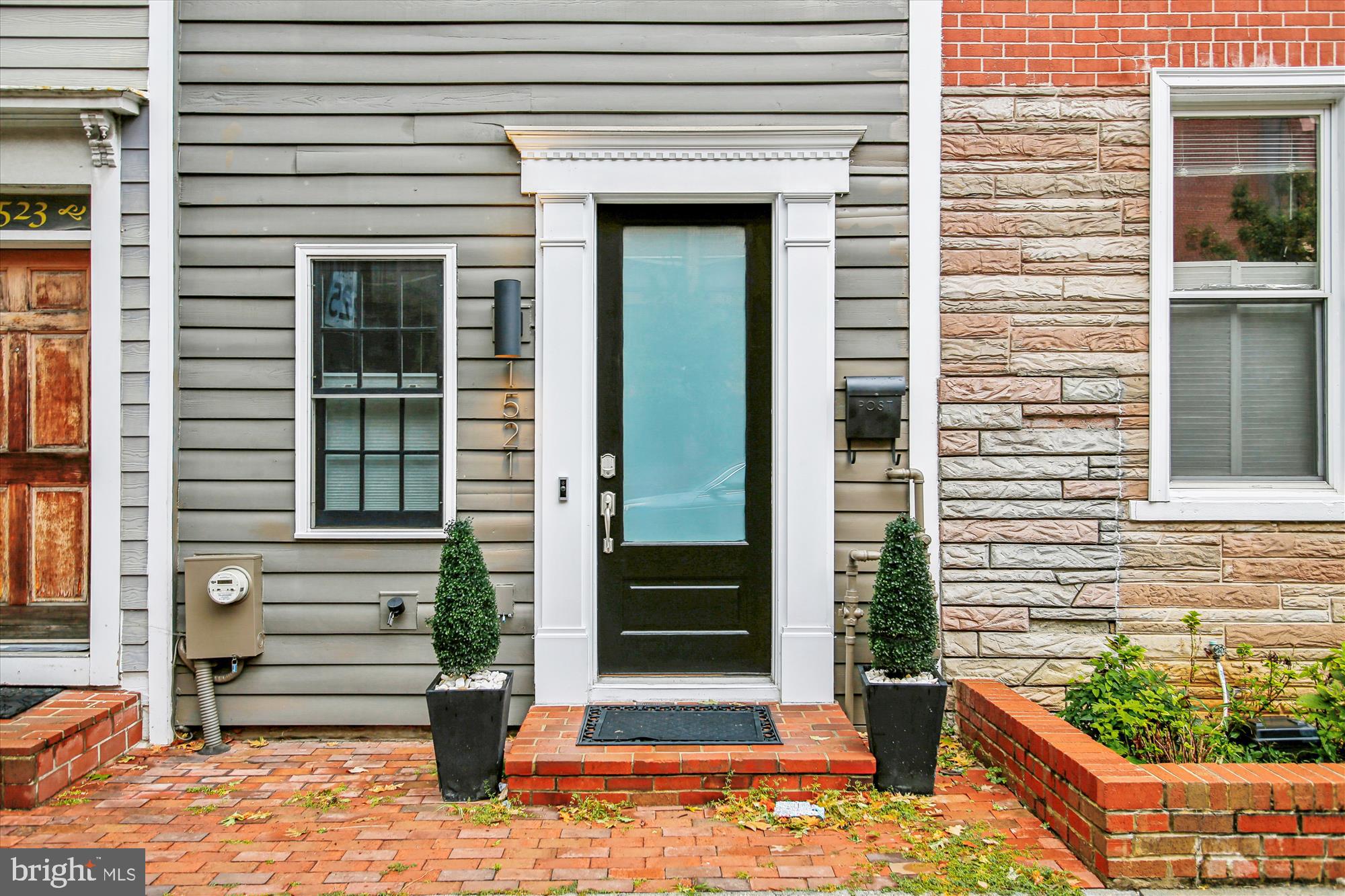 1521 9th Street Northwest Washington, DC 20001 - Photo 34 of 35 a front view of a house with a porch