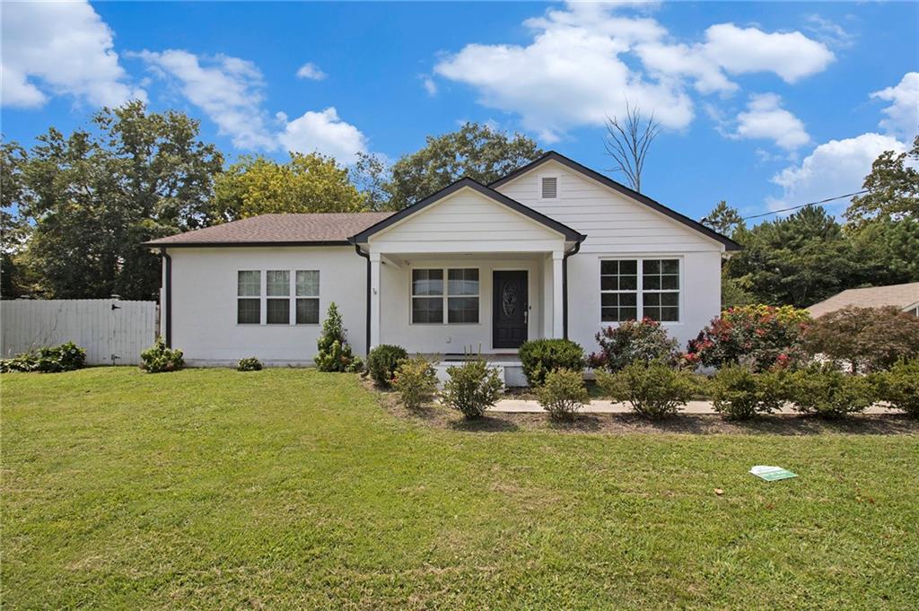 3960 5th Street Atlanta, GA 30360 - Photo 1 of 1 a front view of house with yard and green space