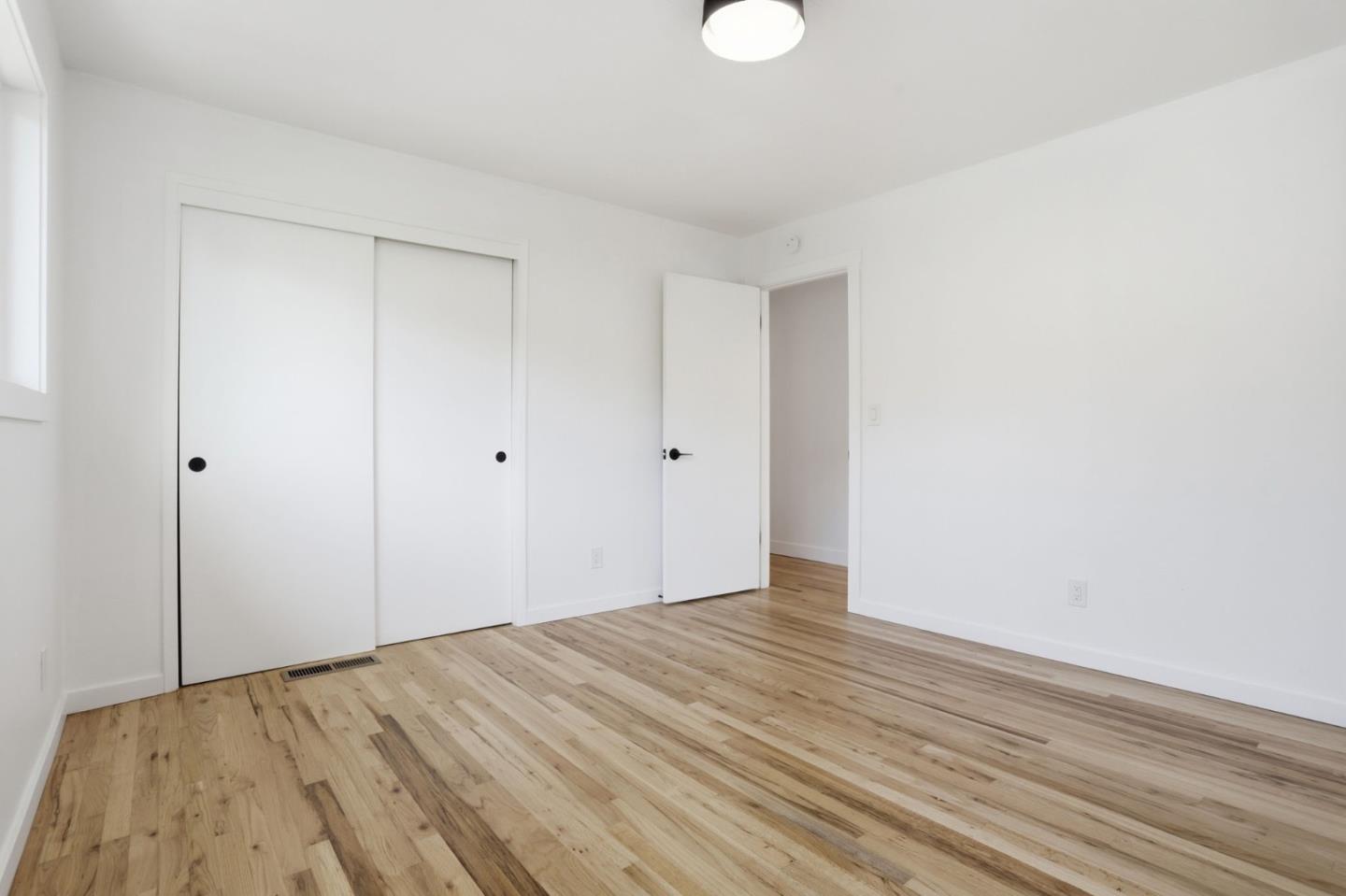 3233 Maplethorpe Lane Soquel, CA 95073 - Photo 13 of 35 a view of empty room with wooden floor