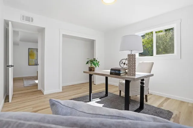 a view of a room that has a window in it