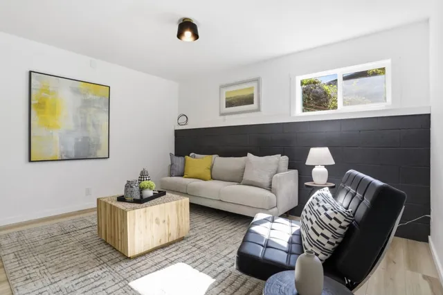 a workspace with furniture and window