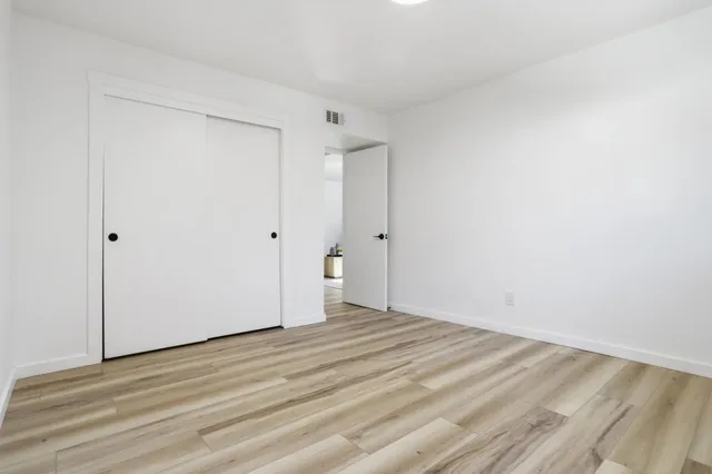 a spacious bathroom with a tub and shower
