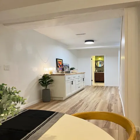 a bathroom with a sink and mirror