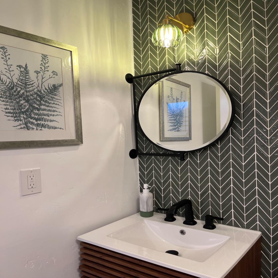 3233 Maplethorpe Lane Soquel, CA 95073 - Photo 29 of 35 a bathroom with a sink and mirror