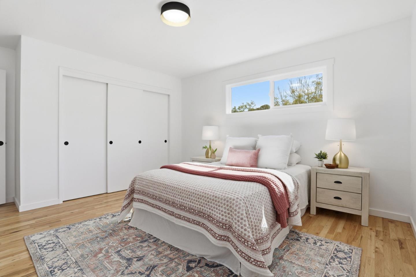 3233 Maplethorpe Lane Soquel, CA 95073 - Photo 10 of 35 a bedroom with a bed and a window