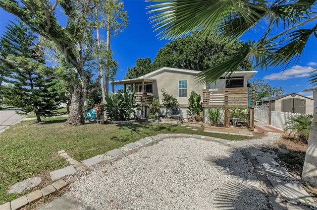 a view of a livingroom with furniture and an empty space