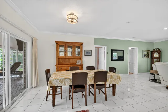 $799,900 | 224 Orange Tree Drive, Atlantis, FL 33462