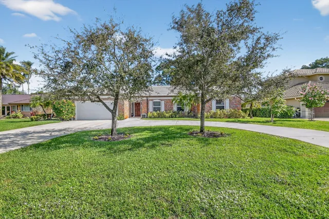 $799,900 | 224 Orange Tree Drive, Atlantis, FL 33462