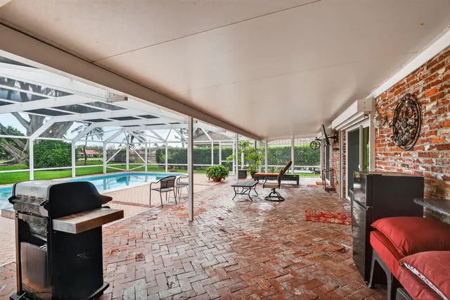 $799,900 | 224 Orange Tree Drive, Atlantis, FL 33462