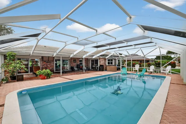 $799,900 | 224 Orange Tree Drive, Atlantis, FL 33462