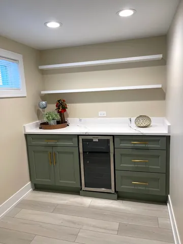 a room with a cabinets and a dresser