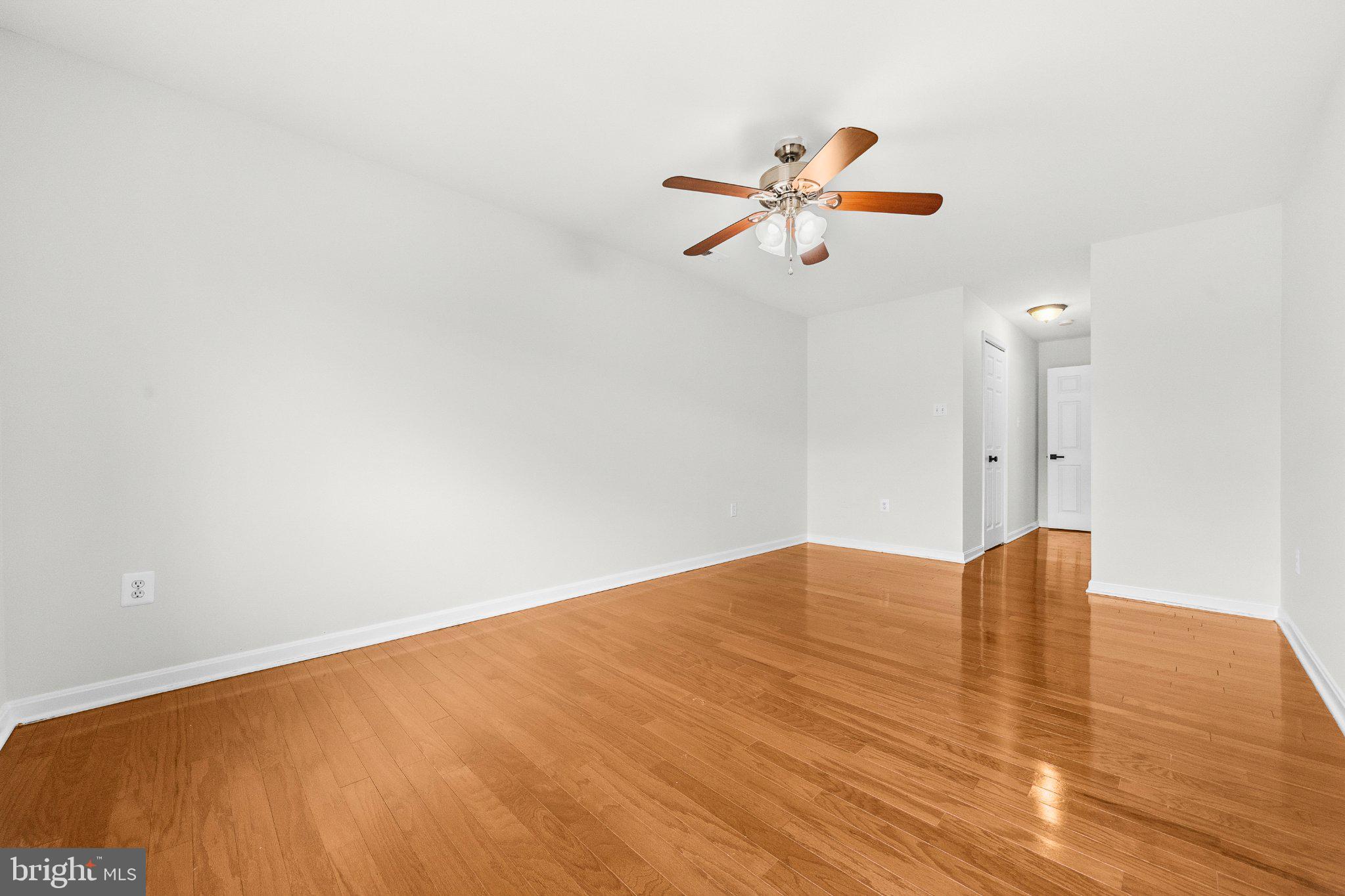 635 Waterloo Road, Unit 222 Warrenton, VA 20186 - Photo 29 of 33 a view of room with wooden floor