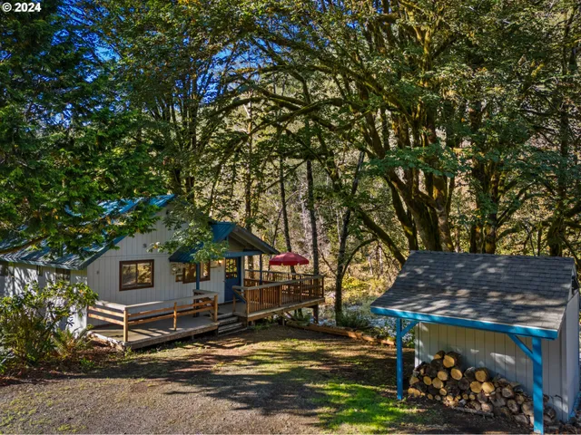 a backyard of a house with lots of green space