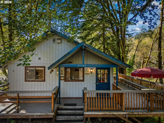 a view of a house with a roof deck
