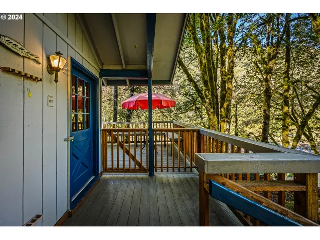 a view of an chairs and table in the balcony