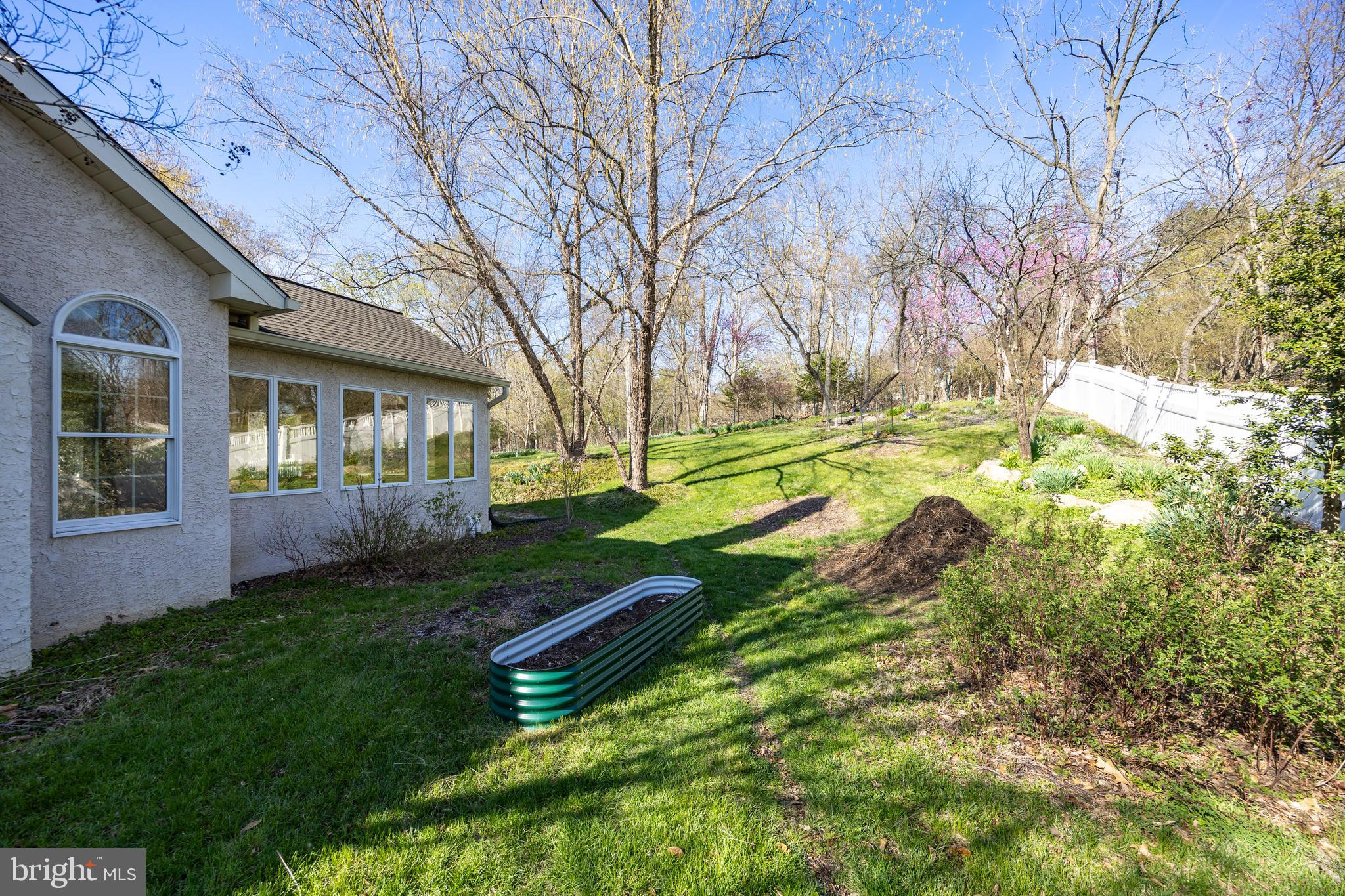 1012 Redtail Road Audubon, PA 19403 - Photo 65 of 80 Side yard showing sunroom