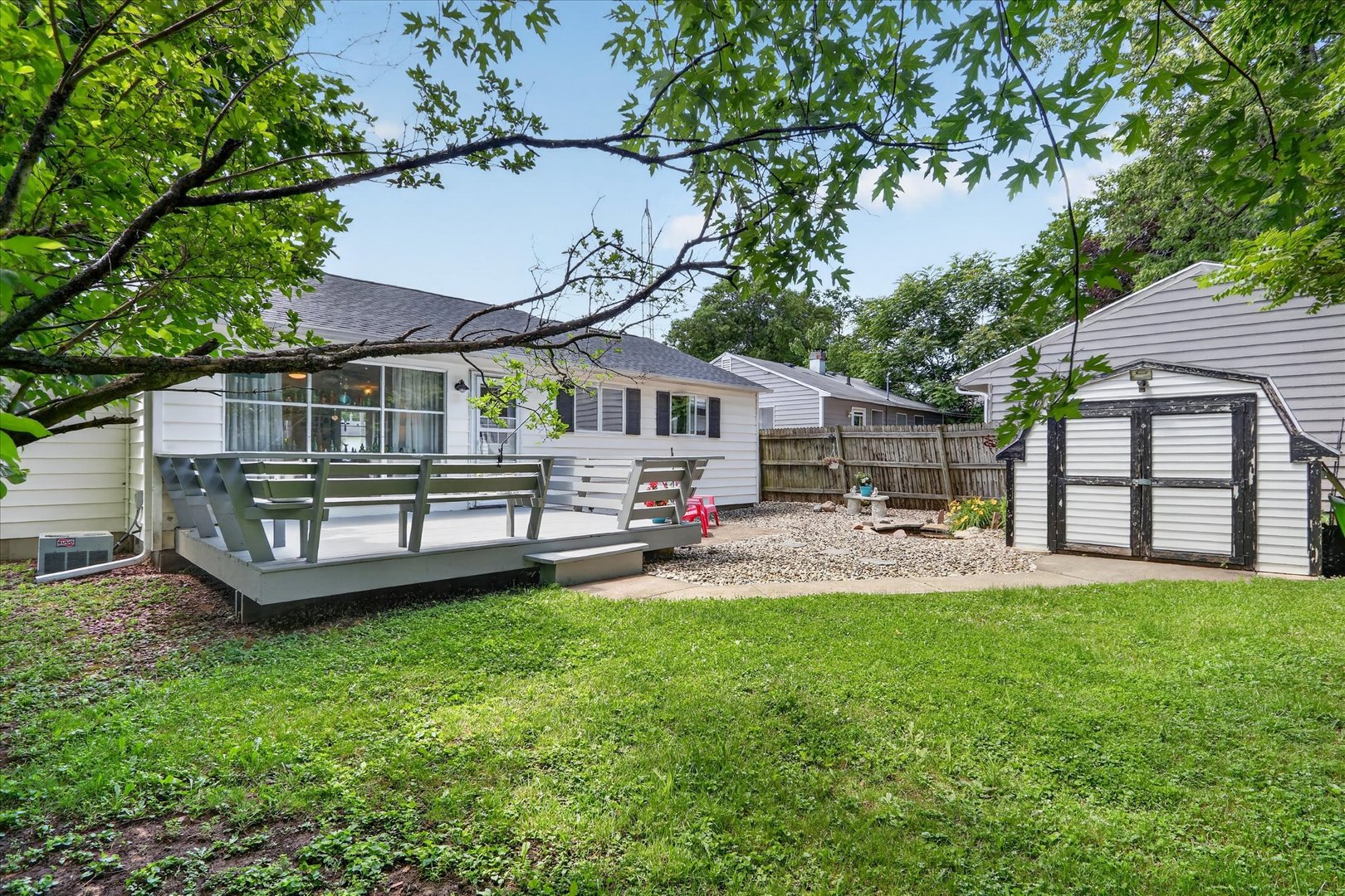1204 West Violet Street Freeport, IL 61032 - Photo 30 of 36 an outdoor view of house with backyard and swimming pool