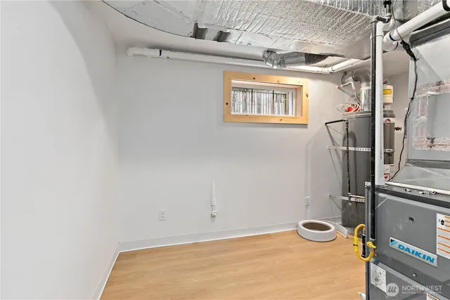 a view of a patio with a table and chairs