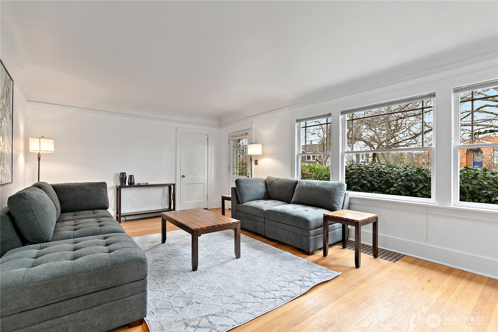 1125 North 77th Street Seattle, WA 98103 - Photo 5 of 38 a living room with furniture and a window
