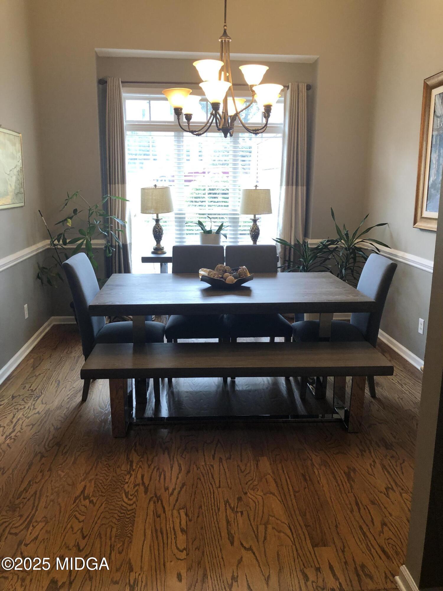 630 Millrun Court Macon, GA 31210 - Photo 11 of 23 a view of a dining room with furniture window and outside view