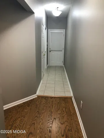 a living room with furniture rug and window