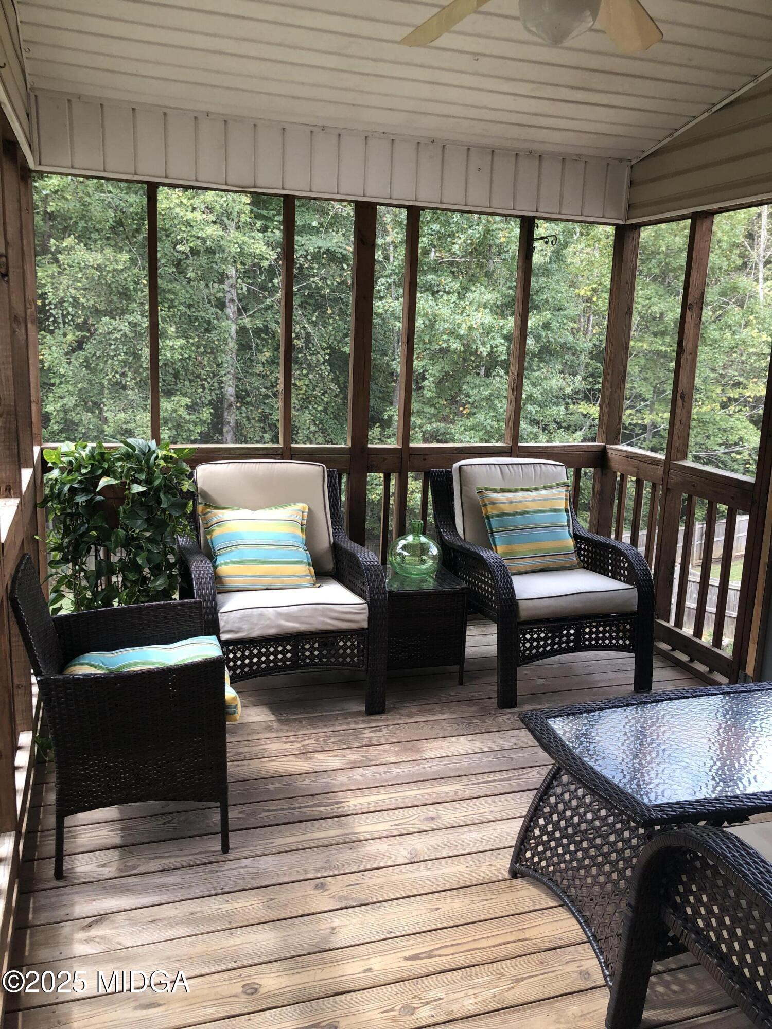 630 Millrun Court Macon, GA 31210 - Photo 17 of 23 a outdoor living space with furniture and a potted plant