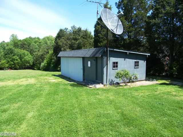 2005 Knight Road Kernersville, NC 27284 - Photo 12 of 13 Shop/Service Bay(s). Outbuilding has new newer roof, 220/110 amp power and water for your workshop or hobbies