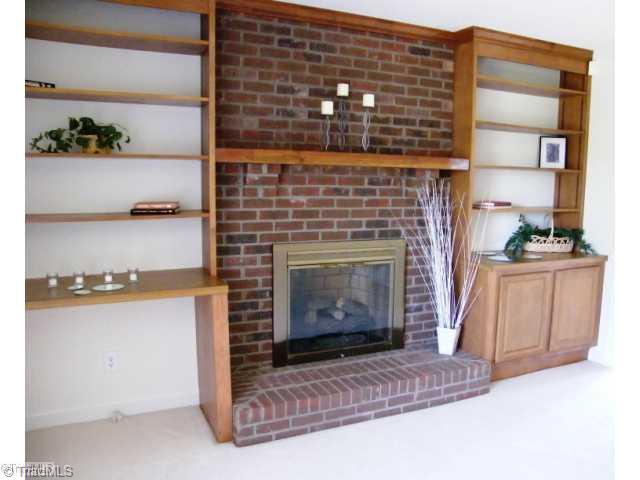 2005 Knight Road Kernersville, NC 27284 - Photo 3 of 13 Living Room. Large living room has wood burning fireplace and built in shelving