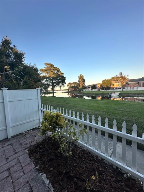 a view of a garden with houses