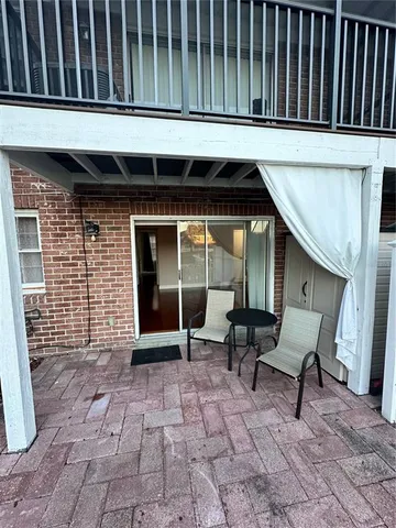 a bench sitting in front of a building