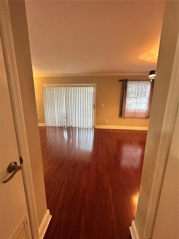 wooden floor in a hall with an entryway