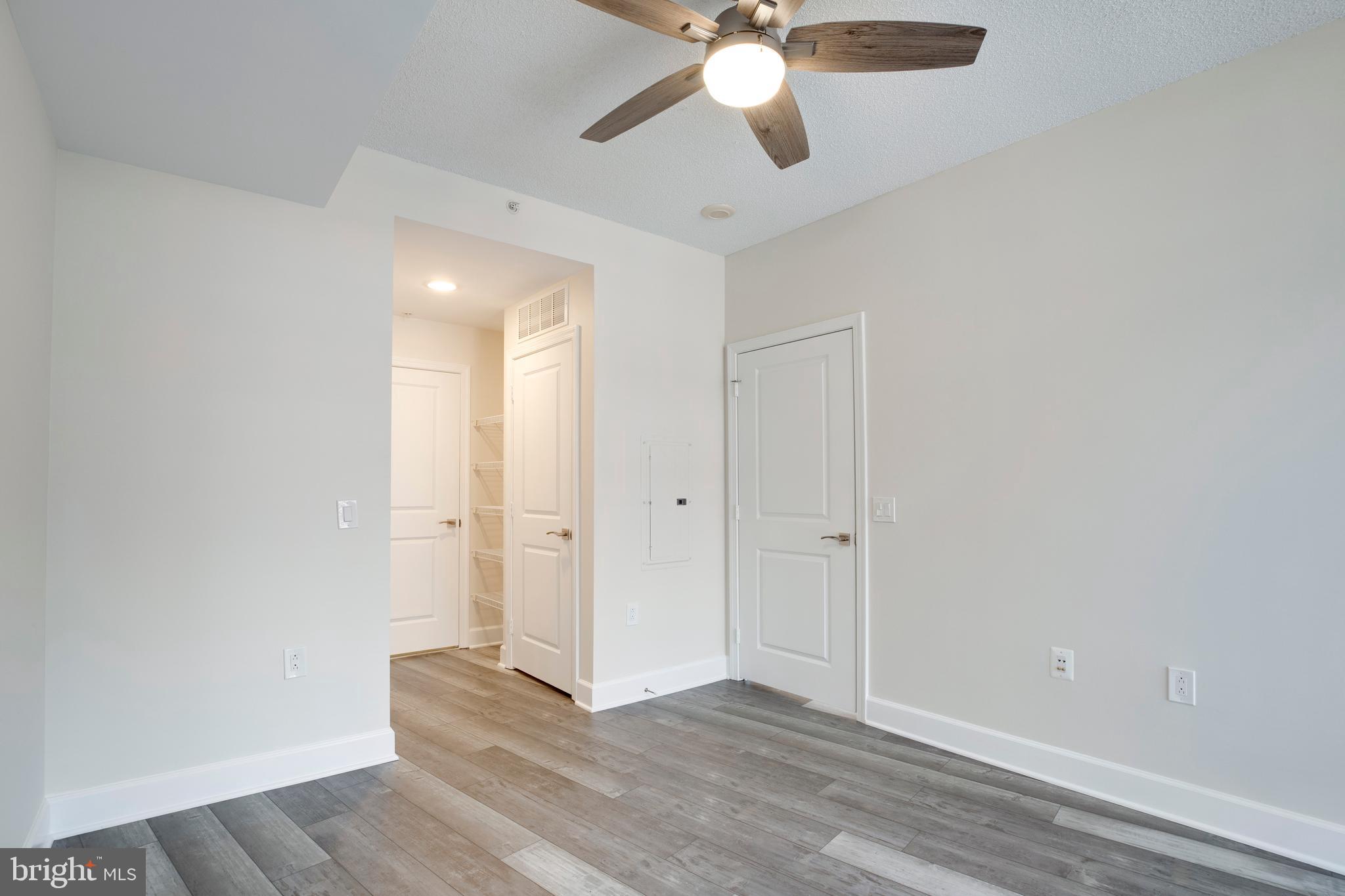 3600 South Glebe Road, Unit 427W Arlington, VA 22202 - Photo 16 of 49 a view of an empty room with wooden floor