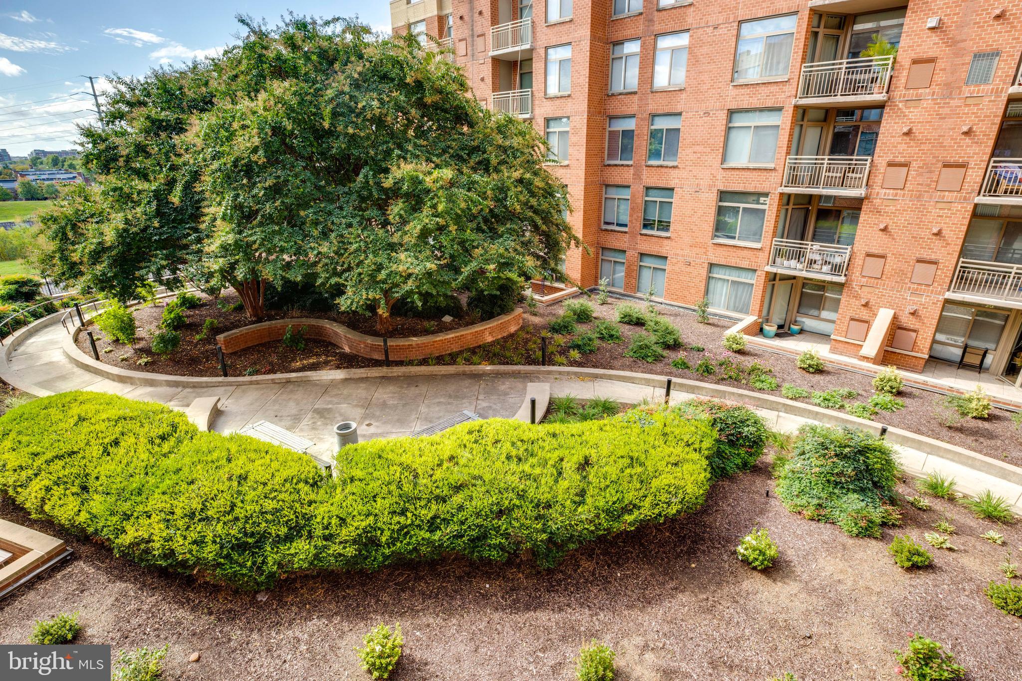 3600 South Glebe Road, Unit 427W Arlington, VA 22202 - Photo 24 of 49 a view of a garden with a house