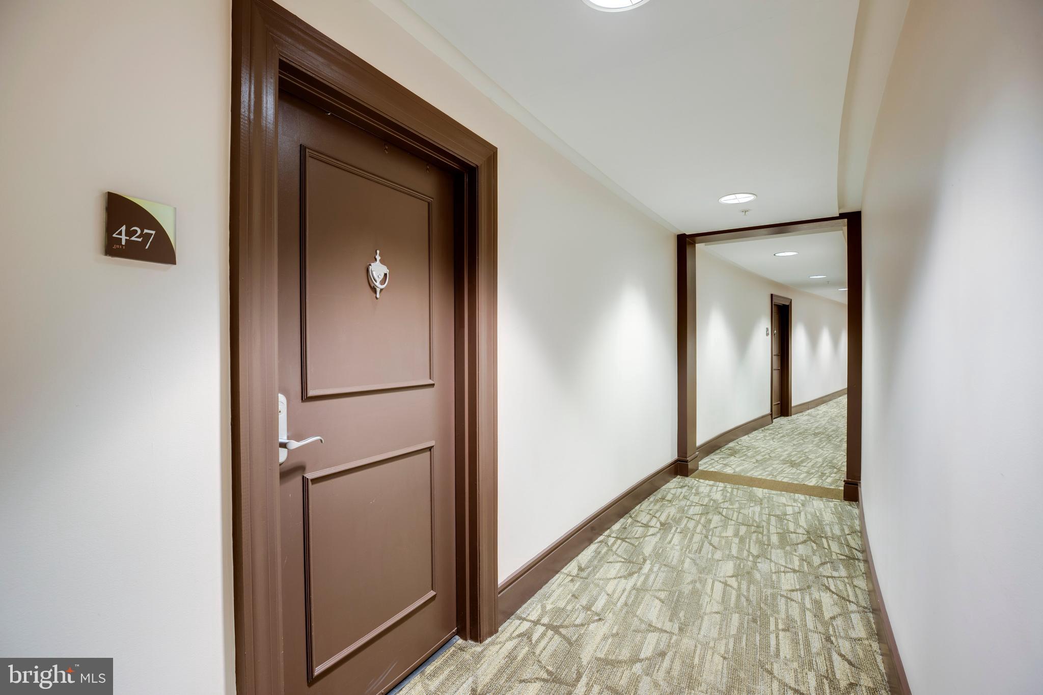 3600 South Glebe Road, Unit 427W Arlington, VA 22202 - Photo 25 of 49 a view of hallway with wooden floor