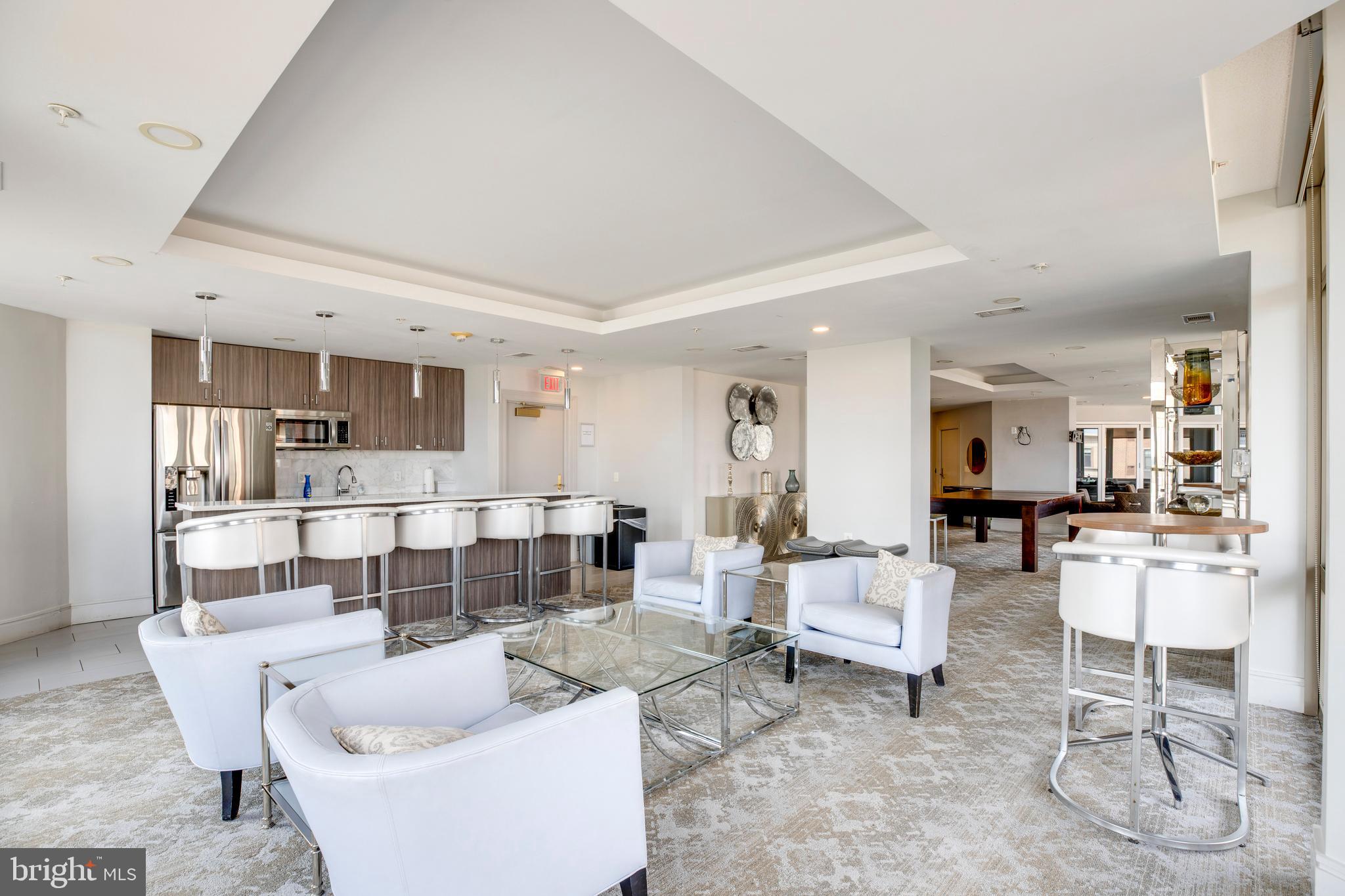 3600 South Glebe Road, Unit 427W Arlington, VA 22202 - Photo 40 of 49 a living room with furniture and a table