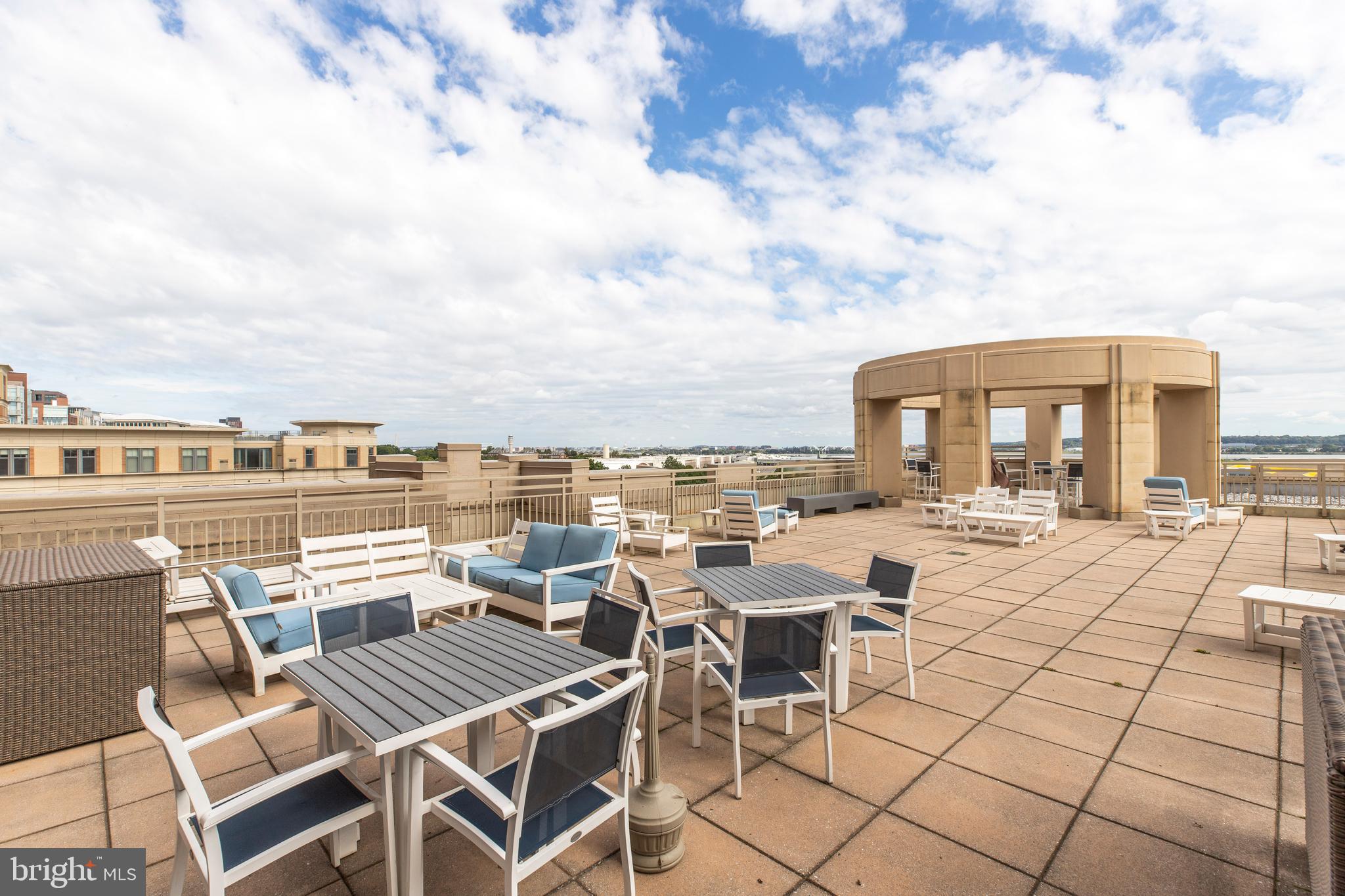 3600 South Glebe Road, Unit 427W Arlington, VA 22202 - Photo 41 of 49 a view of a terrace with furniture and stove