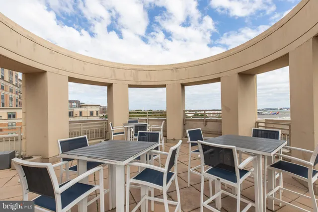 a view of a terrace with chairs