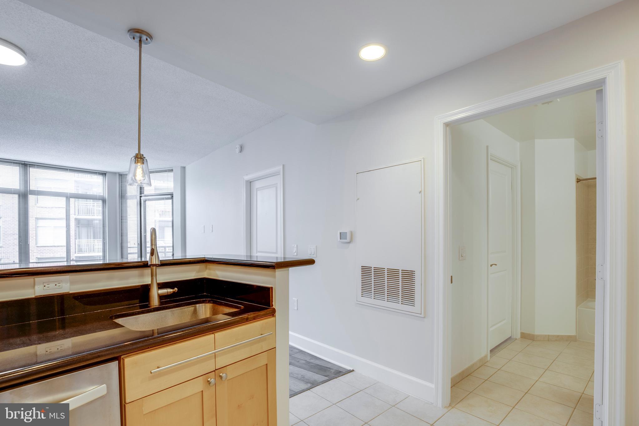 3600 South Glebe Road, Unit 427W Arlington, VA 22202 - Photo 6 of 49 a kitchen with a sink and cabinets
