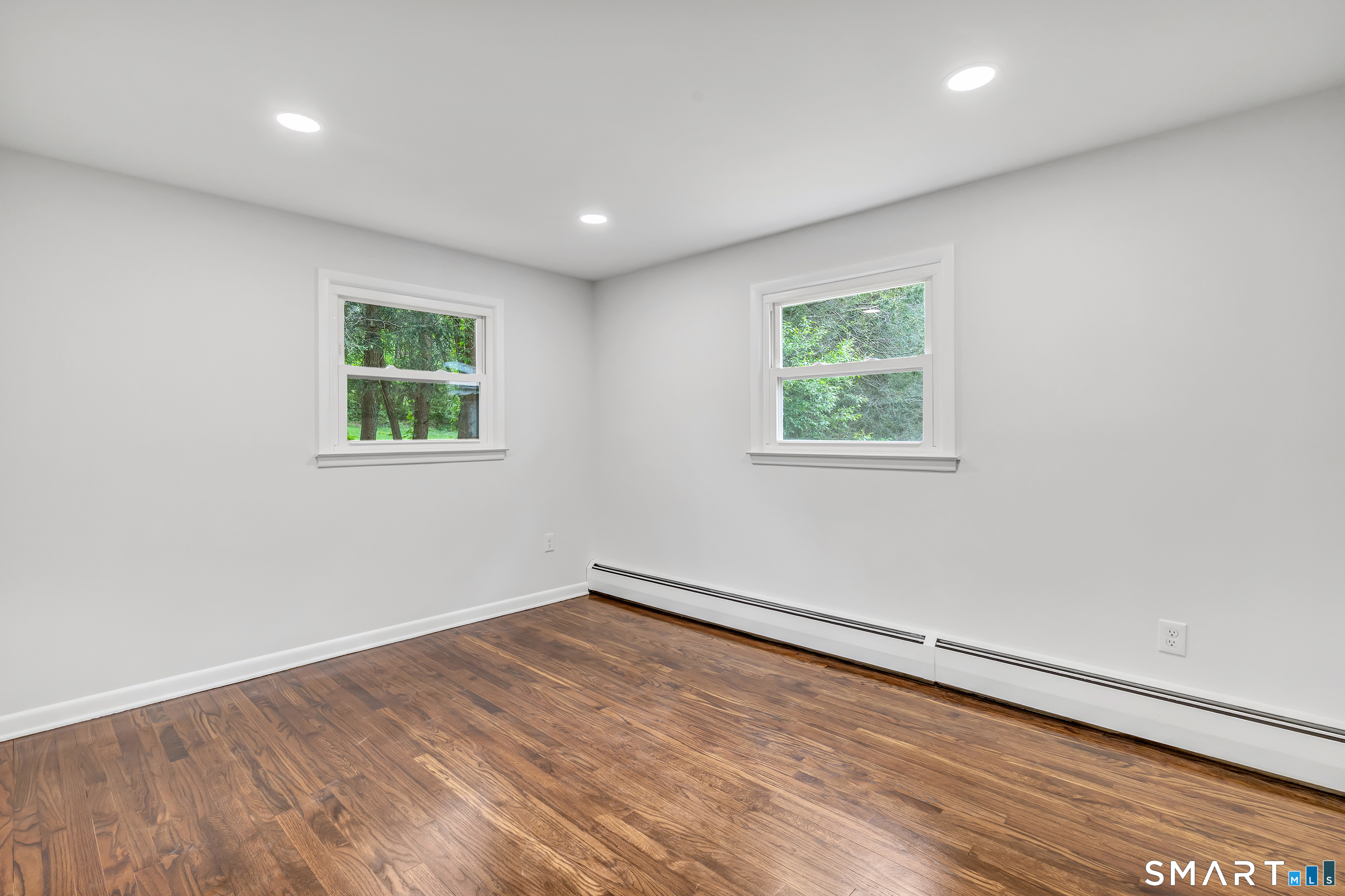 7 Longview Road Newtown, CT 06482 - Photo 25 of 40 an empty room with a window
