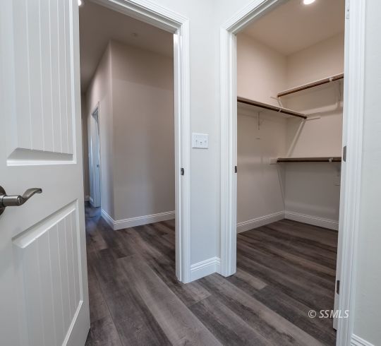 327 Abigail Street Ridgecrest, CA 93555 - Photo 26 of 35 an empty room with wooden floor and closet