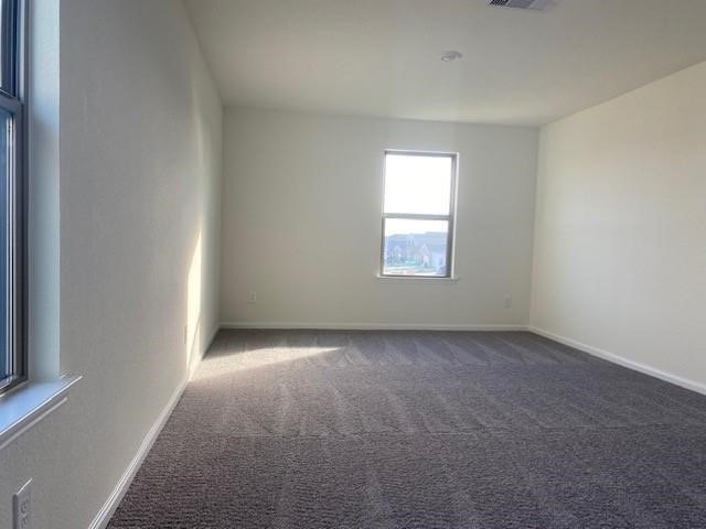 727 Hardwood Grove Houston, TX 77090 - Photo 13 of 26 an empty room with windows