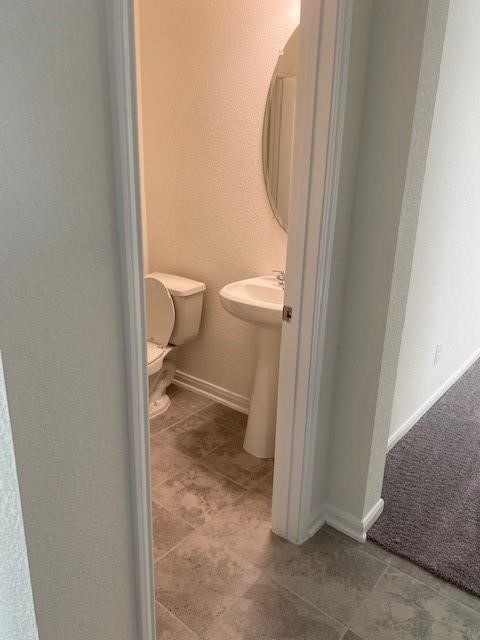 727 Hardwood Grove Houston, TX 77090 - Photo 14 of 26 a view of a bathroom with a sink