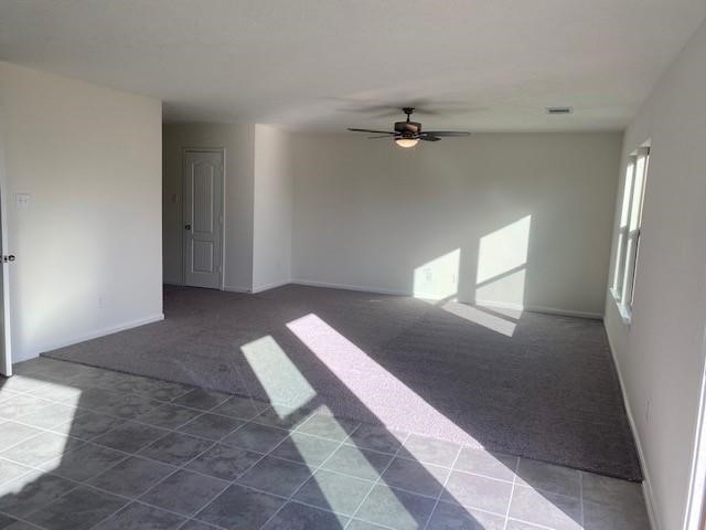 727 Hardwood Grove Houston, TX 77090 - Photo 6 of 26 a view of empty room with a fireplace