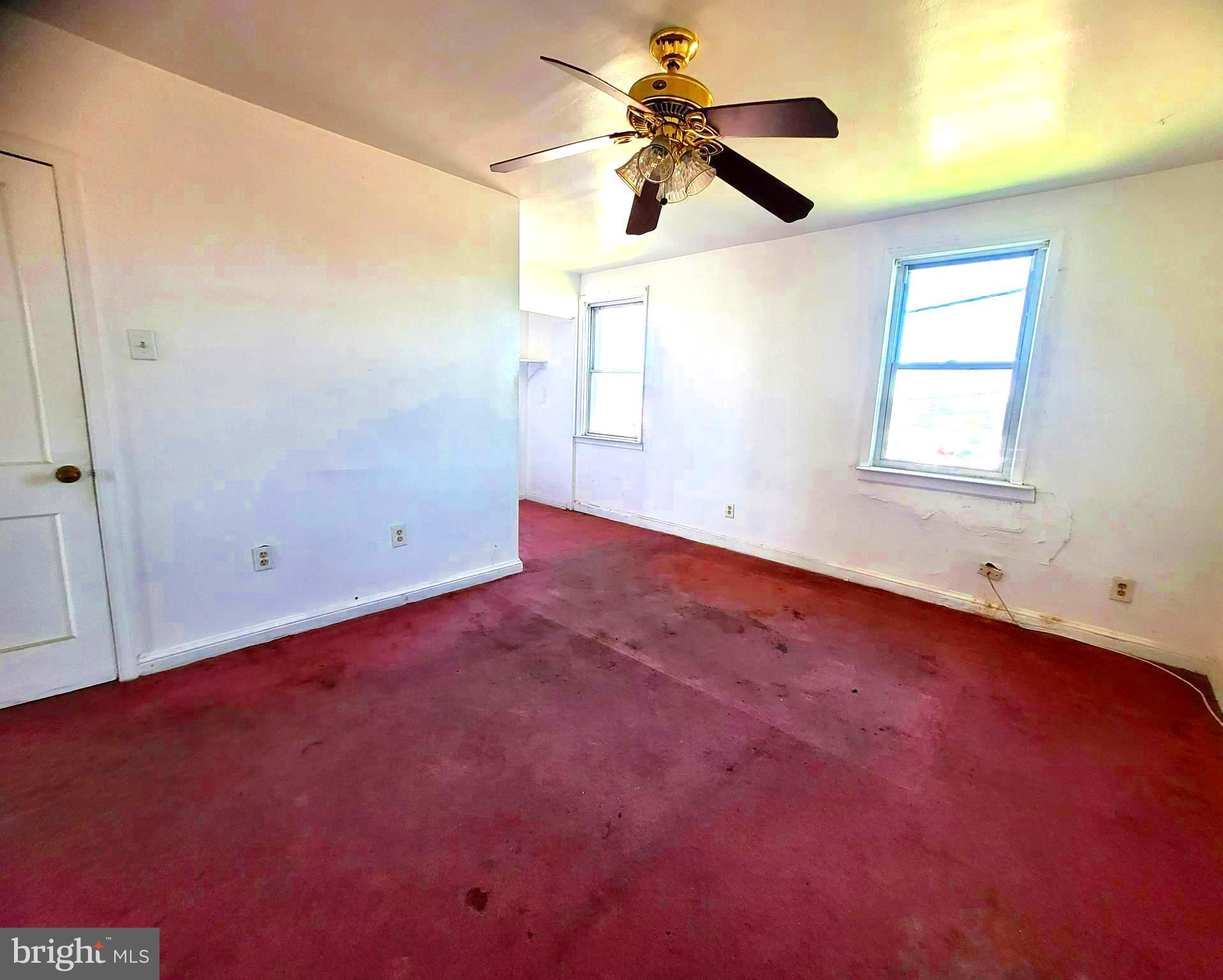 2930 Sollers Point Road Dundalk, MD 21222 - Photo 2 of 12 a view of an empty room with a window