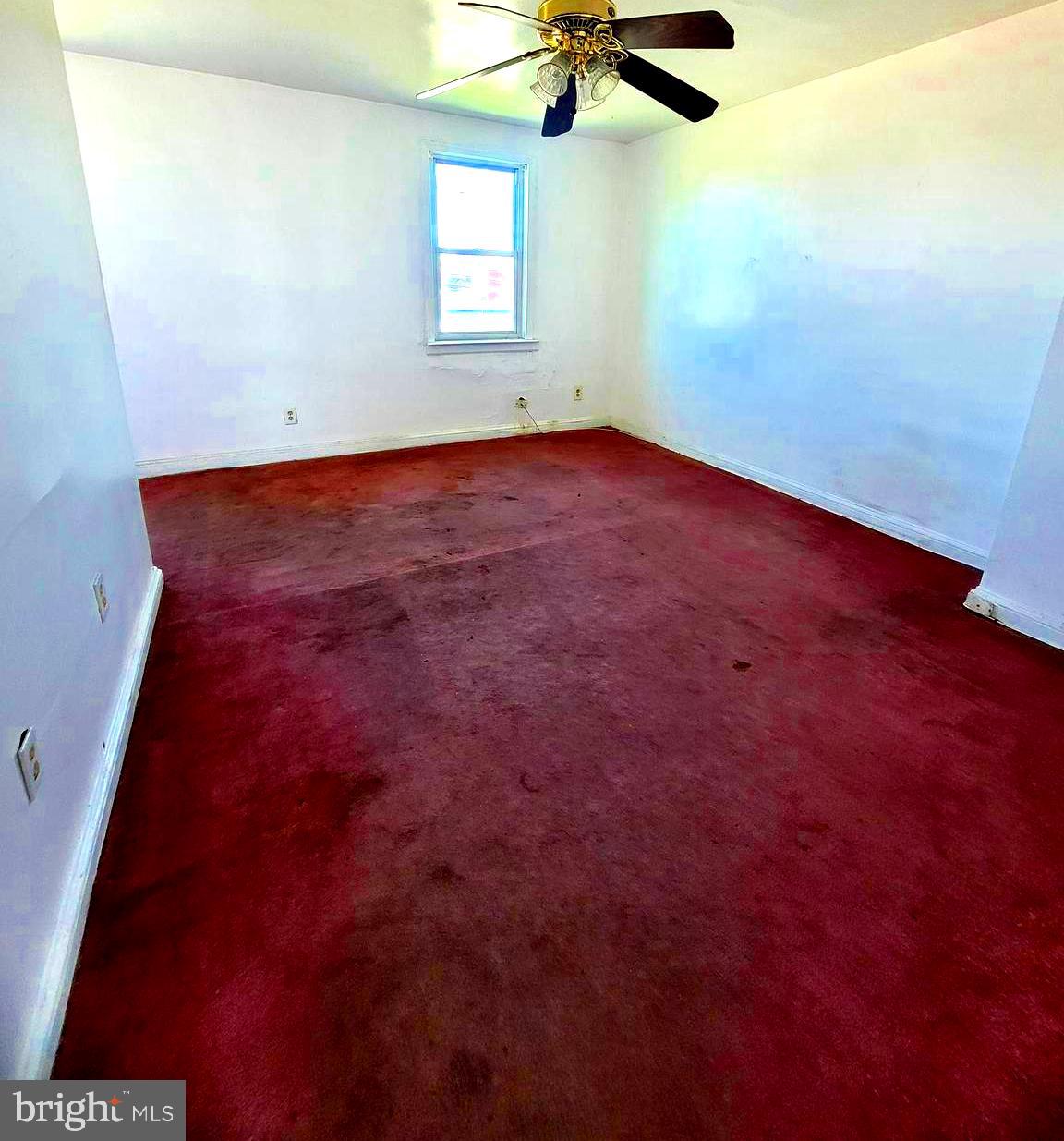 2930 Sollers Point Road Dundalk, MD 21222 - Photo 3 of 12 an empty room with a window