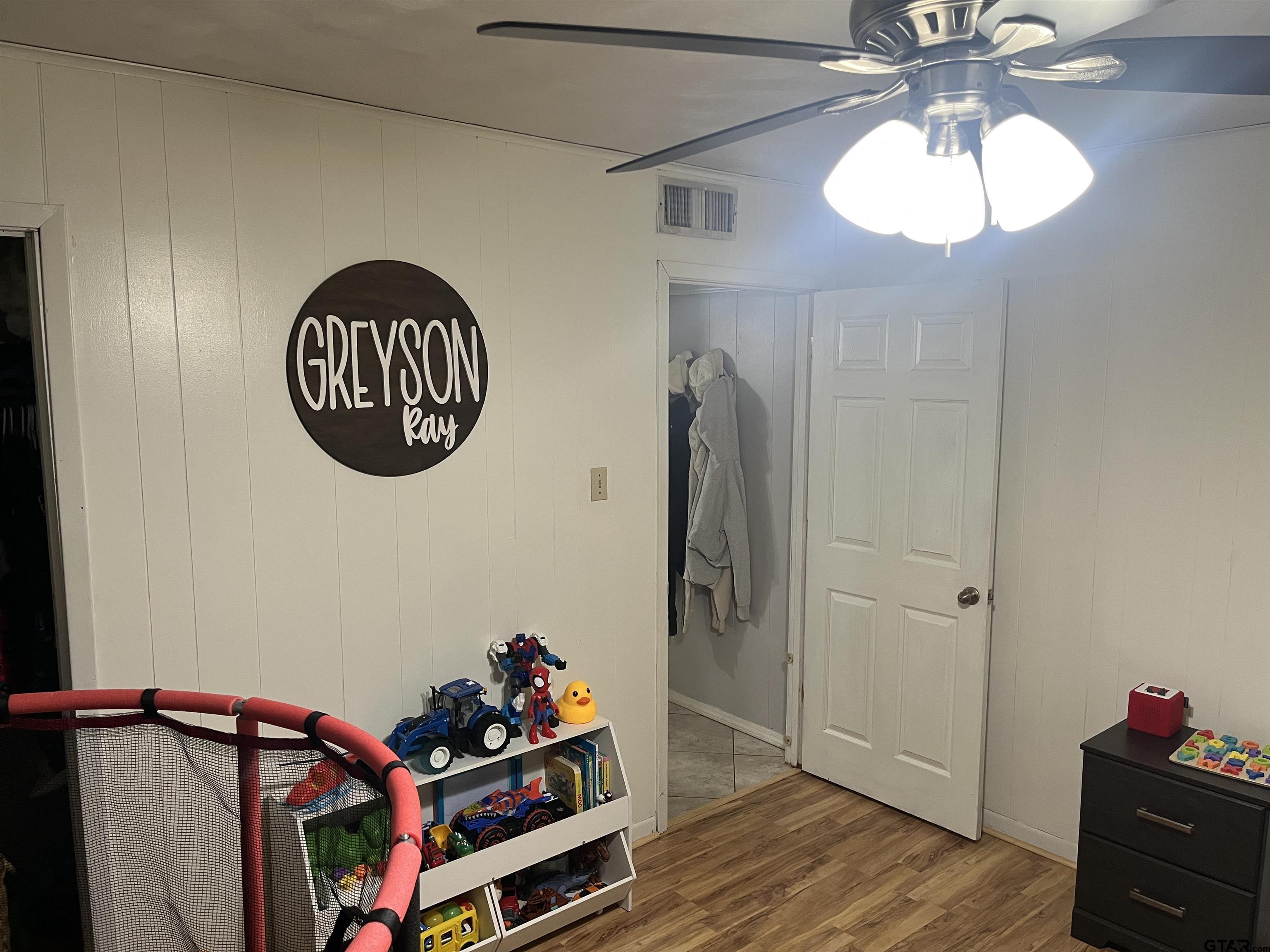407 Fulton Street Pittsburg, TX 75686 - Photo 20 of 30 a view of room with a hallway