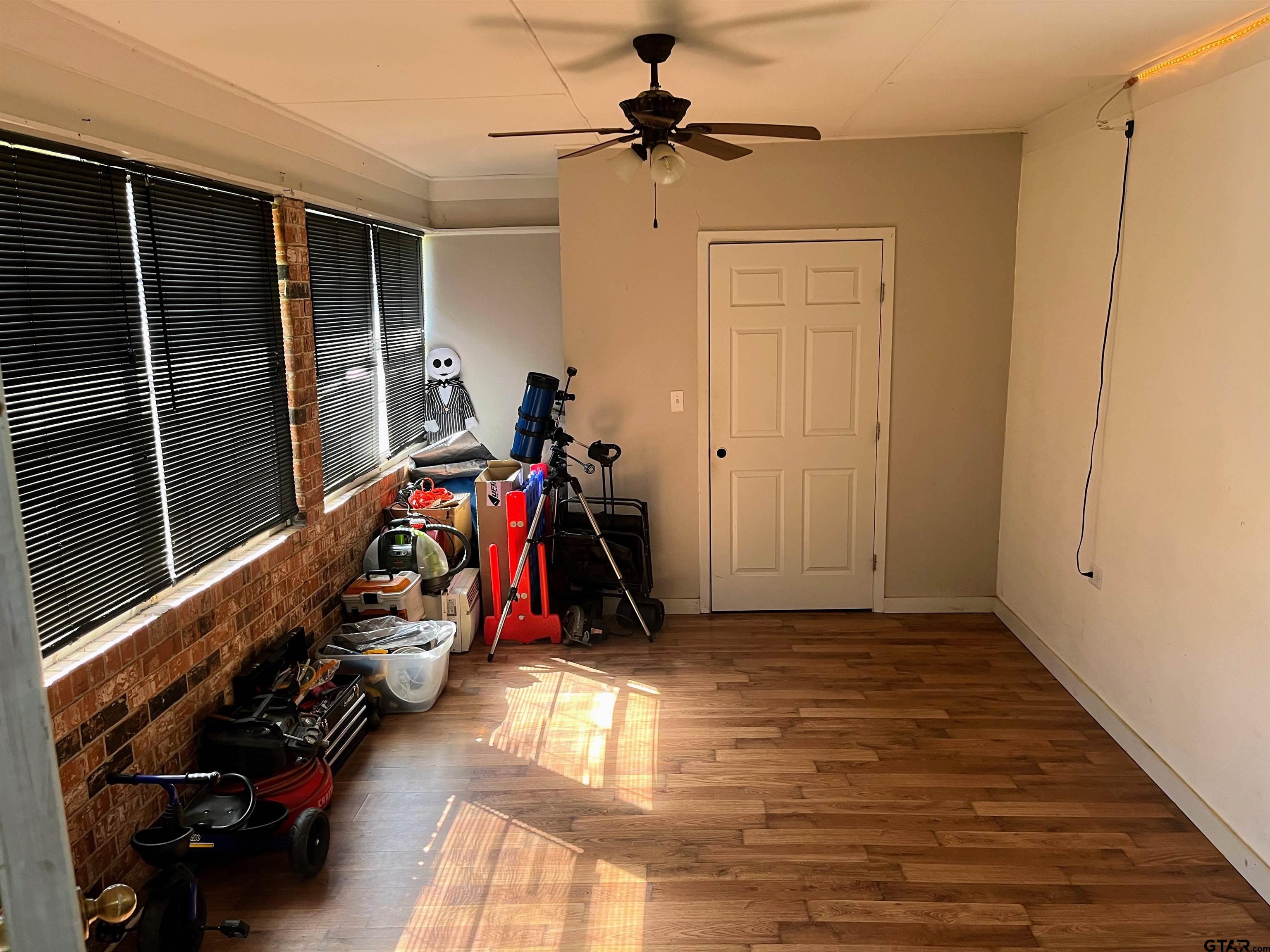 407 Fulton Street Pittsburg, TX 75686 - Photo 23 of 30 a view of a room with gym equipment
