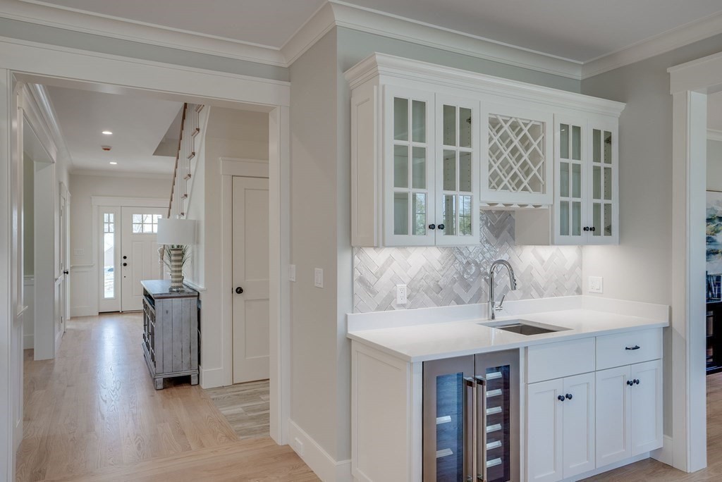24 Damon Road Needham, MA 02494 - Photo 12 of 38 a bathroom with a sink and a mirror