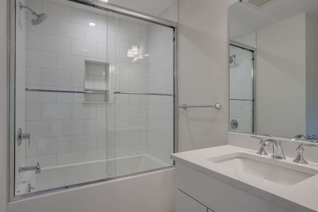 24 Damon Road Needham, MA 02494 - Photo 23 of 38 a bathroom with a shower and a sink