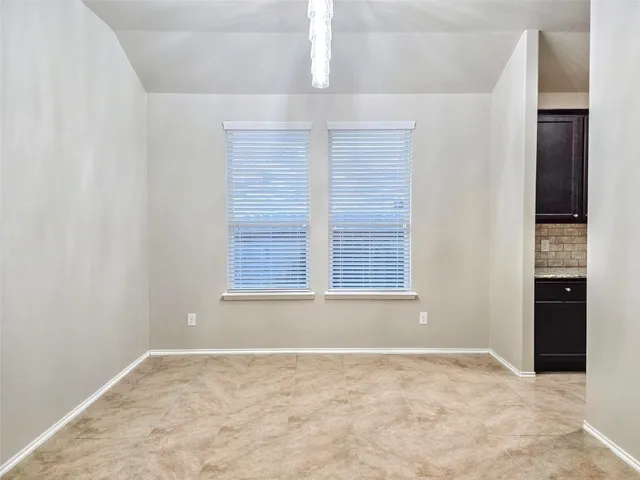 an empty room with a natural light